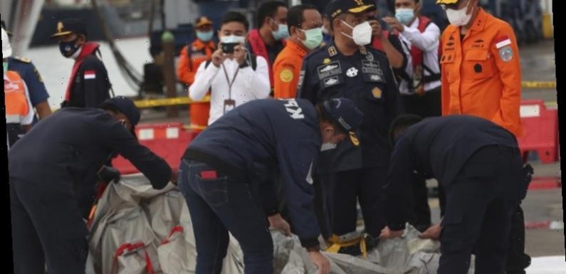 Body parts, debris found after Sriwijaya Air Flight 182 plane crash