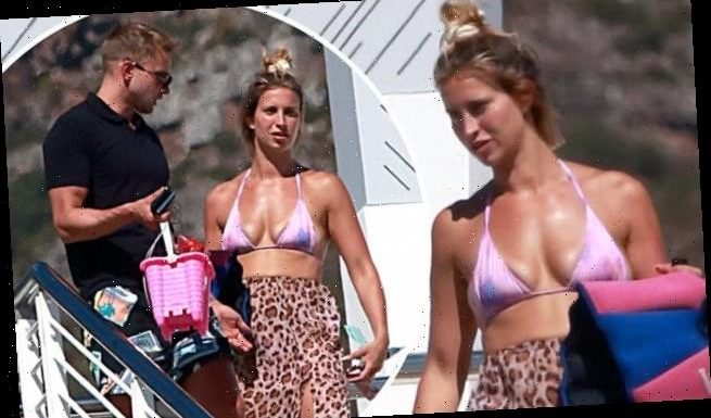Ferne McCann slips into a lilac bikini in Cape Town