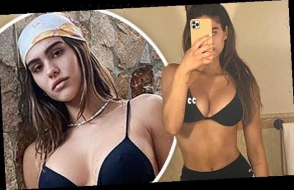 Amelia Hamlin poses for a risqué mirror selfie in a tiny black bra