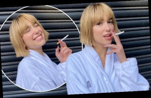 Dua Lipa debuts blonde bob and poses with a cigarette in new snaps