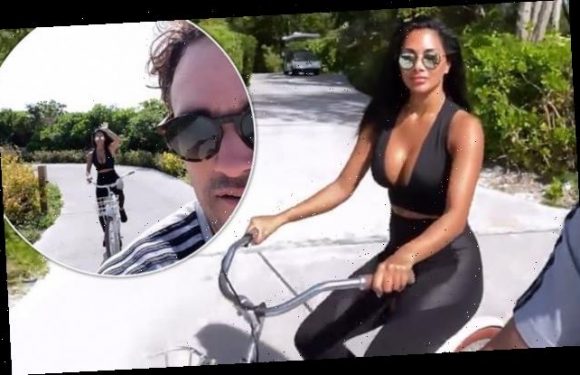 Nicole Scherzinger enjoys bike ride with beau Thom Evans on holiday
