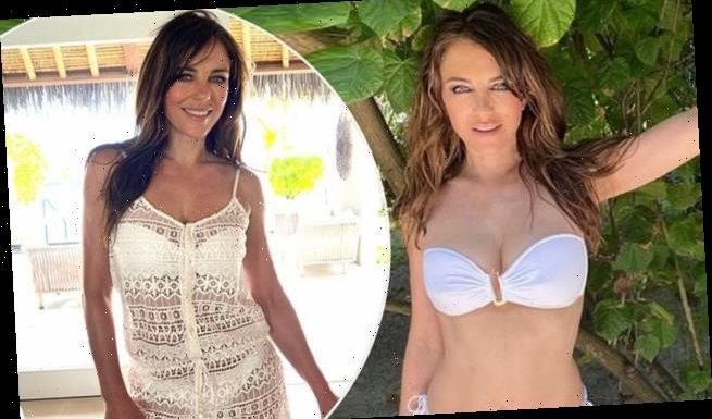 Elizabeth Hurley poses in a white bikini in throwback Maldives snaps