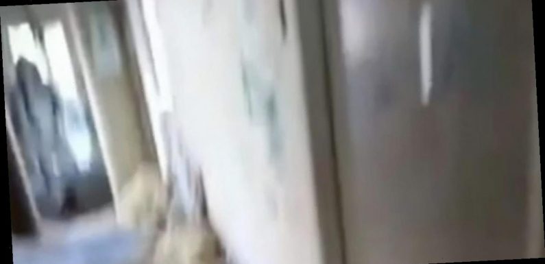 Woman’s ‘stomach turns’ after noticing ‘ghost’ watching her in abandoned asylum