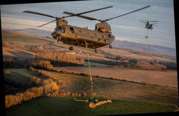 RAF Chinook sinks in mud after rookie pilots forced to make emergency landing in bog