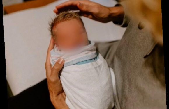 Mum left gobsmacked after baby is born with a full head of blonde hair after her husband was adamant he’d be bald