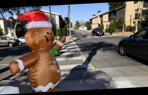 An inflatable Christmas costume may have spread coronavirus particles at a California hospital, potentially infecting 43 employees