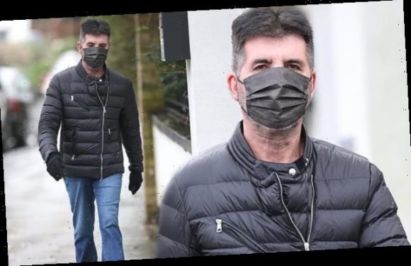 Simon Cowell shows his 20lbs weight loss while on a stroll in London
