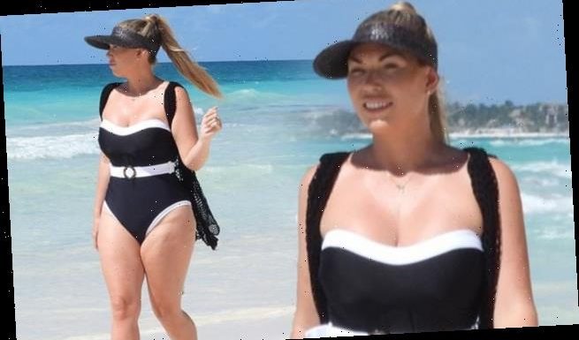 Frankie Essex shows off her hourglass curves in a monochrome swimsuit