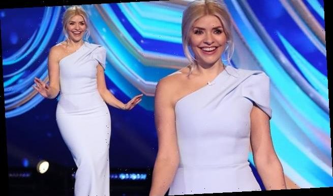 Holly Willoughby flaunts her figure in  blue dress on Dancing On Ice