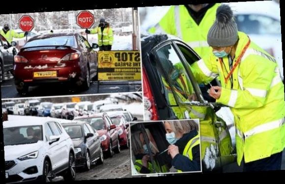 Motorists go to drive-through vaccination centres to get Covid-19 jab
