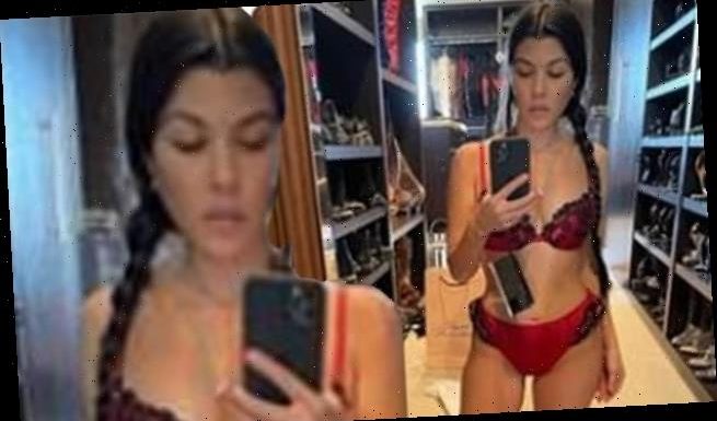 Kourtney Kardashian looks incredible in red silk lingerie