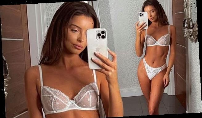 Maura Higgins flaunts her toned figure in lacy white lingerie