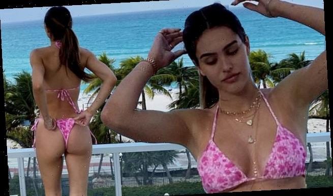 Amelia Gray Hamlin puts on cheeky display in tiny pink bikini in Miami