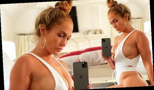 Jennifer Lopez flashes her fit frame in a white bodysuit