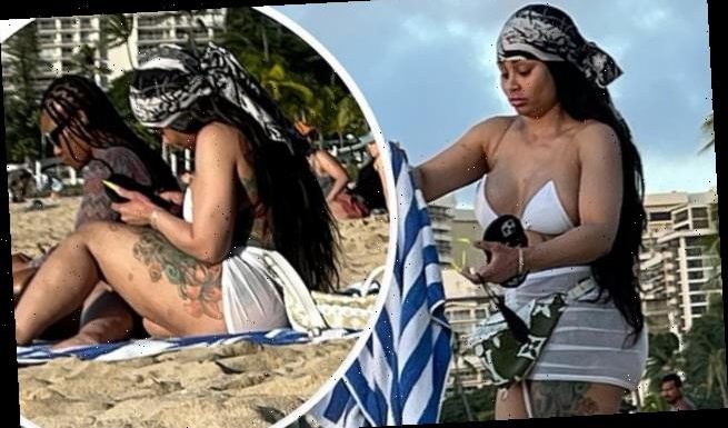 Blac Chyna relaxes on the beach with a friend in Hawaii