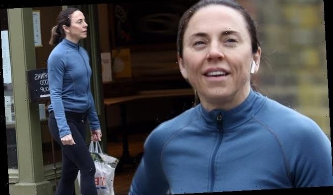 Mel C goes makeup free in a tight blue running jacket