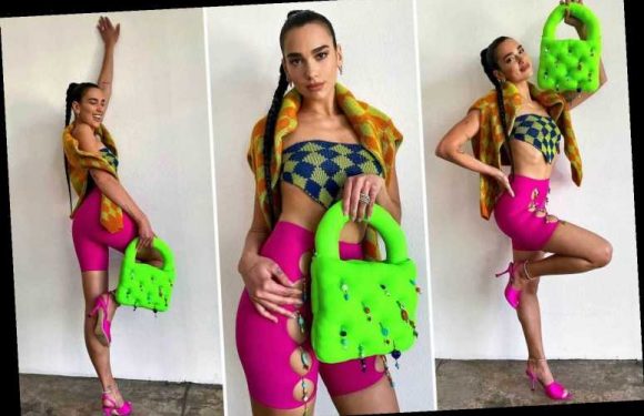 Dua Lipa embraces clashing colours in a skintight get-up at a Vogue photoshoot
