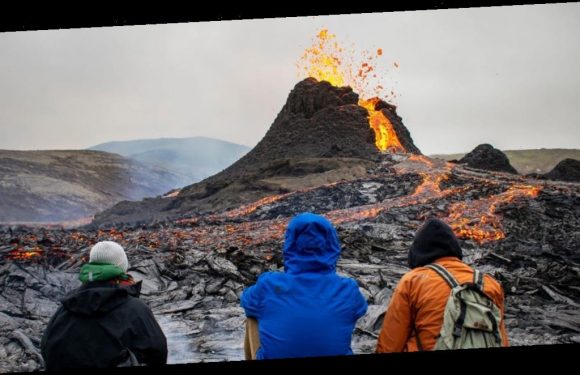 Photos show crowds gathering in Iceland to witness long-dormant volcano eruption
