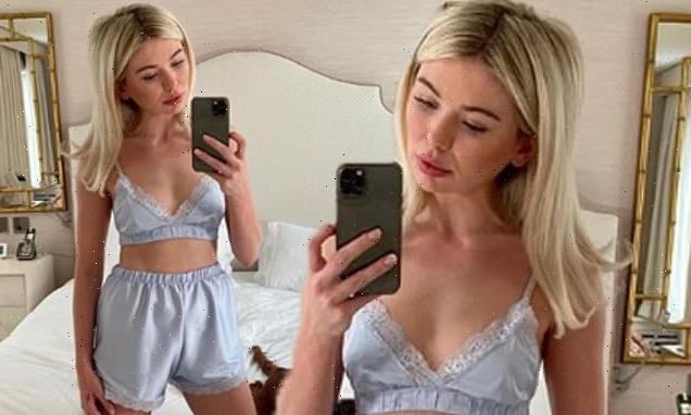 Georgia Toffolo shows off her slender frame in a lacy blue bralet