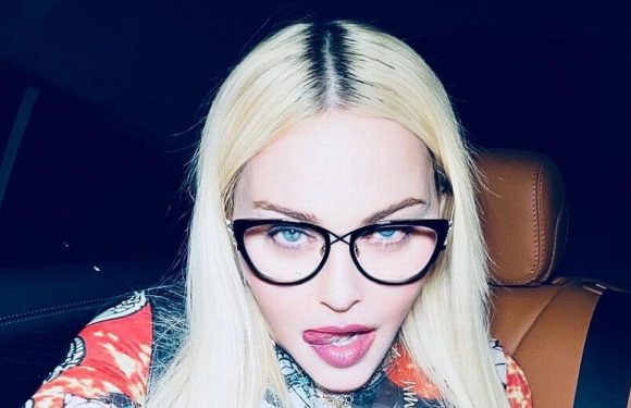 Madonna, 62, looks youthful as ever in skintight leather trousers and tiny top