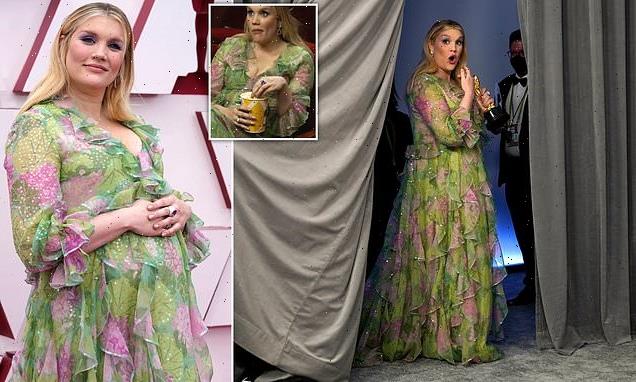 Oscars 2021: Emerald Fennell debuts her baby bump on the pink carpet