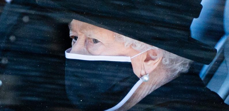 Queen Elizabeth ‘keeps Prince Philip’s handkerchief and precious photo in her handbag’ as she sits alone at funeral