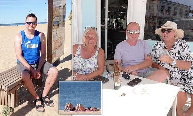 Britons soak up the sun on Algarve beach 24 hours after arriving