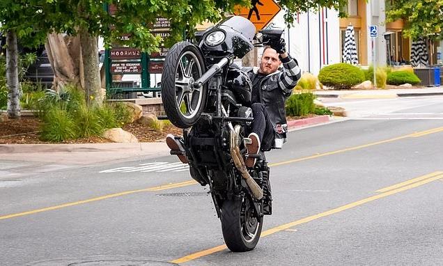Chet Hanks pops wheelies in Malibu on his Harley-Davidson motorcycle