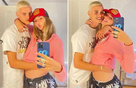David and Victoria Beckham's son Romeo, 18, sparks rumours his model girlfriend Mia Regan is PREGNANT with loved up snap