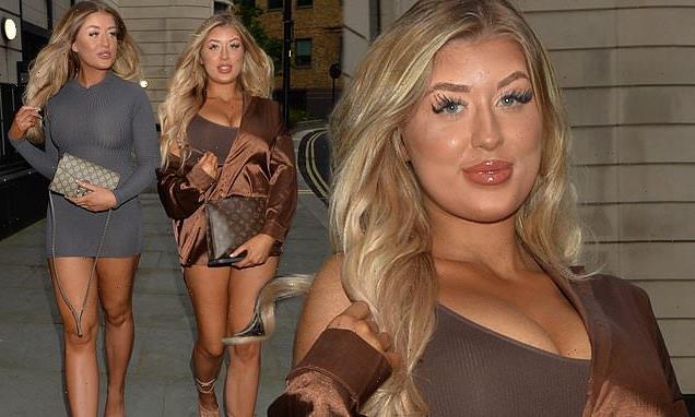 Eve Gale and twin sister Jess flaunt curves during night out