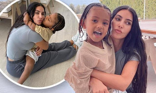 Kim Kardashian shares series of sweet snaps as she cuddles son Saint