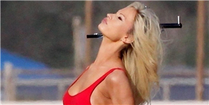 Lily James Looks Exactly Like Pamela Anderson in Her Iconic Red 'Baywatch' Swimsuit