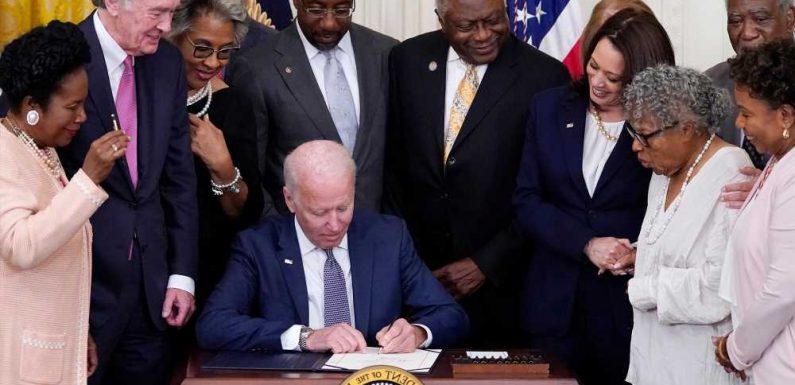 Biden signs Juneteenth holiday into law