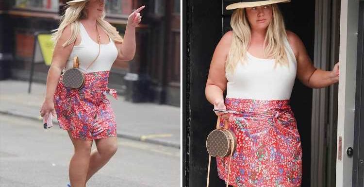 Gemma Collins shows off her shrinking waist in a mini skirt and vest top as she goes into recording studio in London