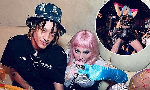 Madonna rocks pink hair and fishnet outfit after surprise performance