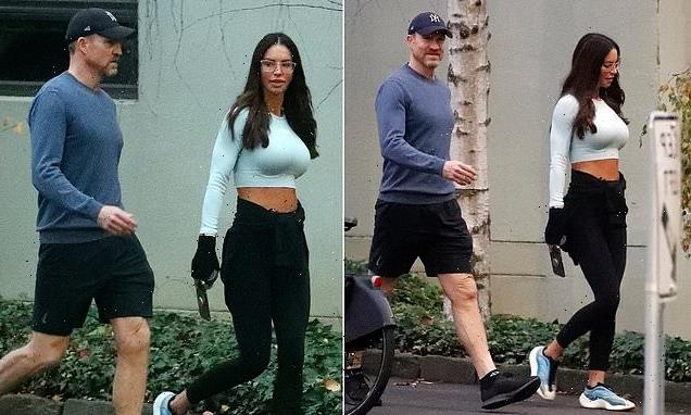 Nathan Buckley enjoys a morning stroll with his girlfriend Alex Pike