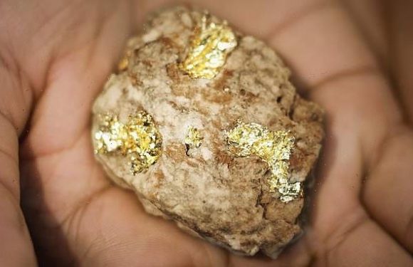 Pyrite, aka 'fool's gold' can contain tiny amounts of the real stuff