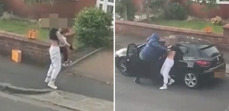 Shocking moment young mum is dragged from her car by knife thugs as she begs to let her save her toddler in the back
