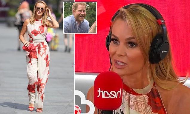 Amanda Holden looks striking in a red and white jumpsuit