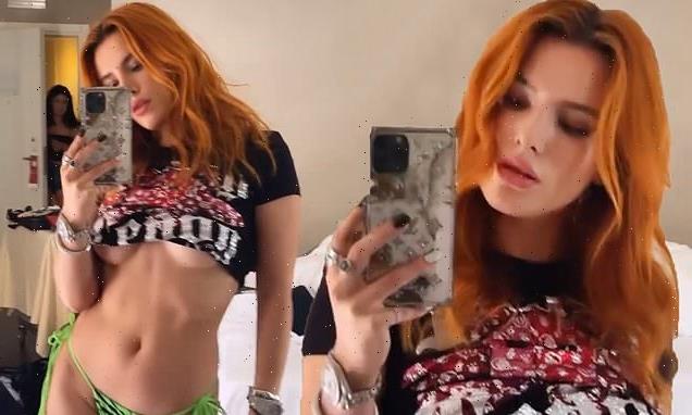 Bella Thorne leaves little to the imagination in a crop top and bikini