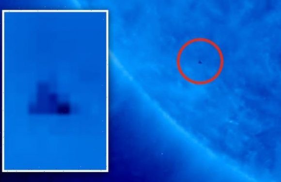 ‘Black triangle’ UFO spotted near Sun is being kept secret from public, claims ET hunter