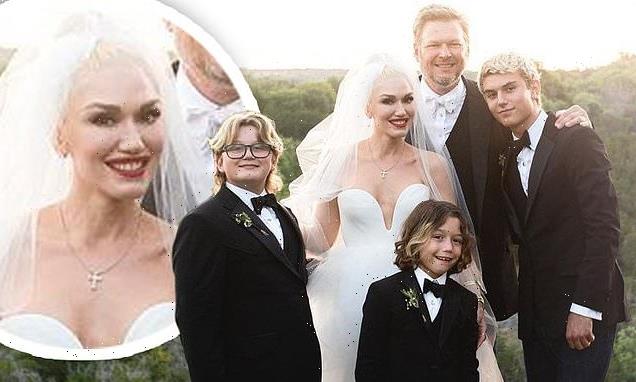 Gwen Stefani and new husband Blake Shelton pose with her sons