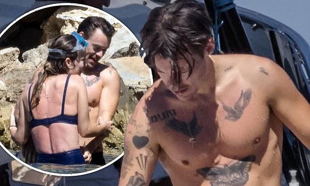 Harry Styles and Olivia Wilde enjoy a day out on a yacht in Italy