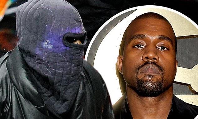 Kanye West sports a ski mask while attending basketball tournament