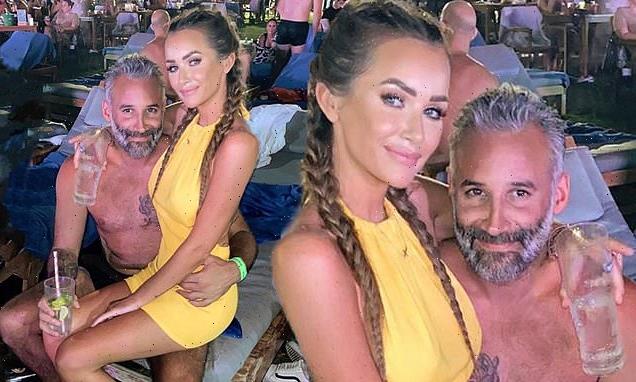 Laura Anderson cosies up to shirtless beau Dane Bowers on date night