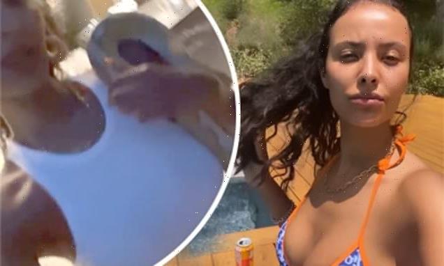 Maya Jama poses with SNAKE coiled around as she enjoys luxury holiday