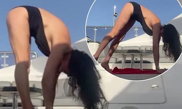 Swimsuit-clad Catherine Zeta-Jones, 51, embarks on a yoga session
