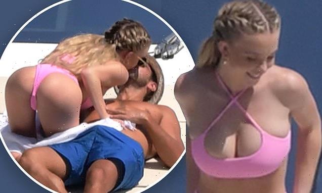 Sydney Sweeney sizzles as she flashes cleavage in tiny pink bikini