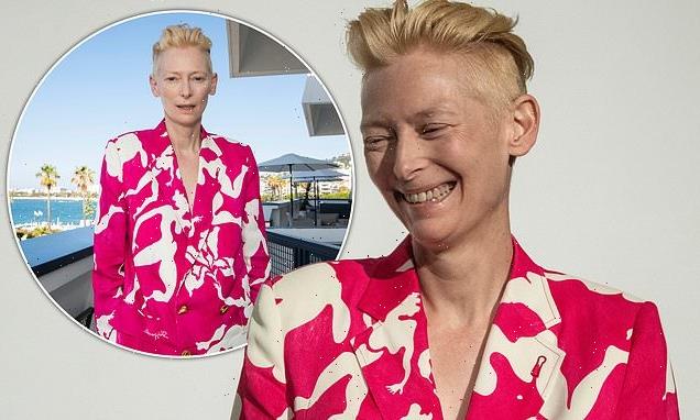 Tilda Swinton displays bold sense of style in a pink camouflage suit