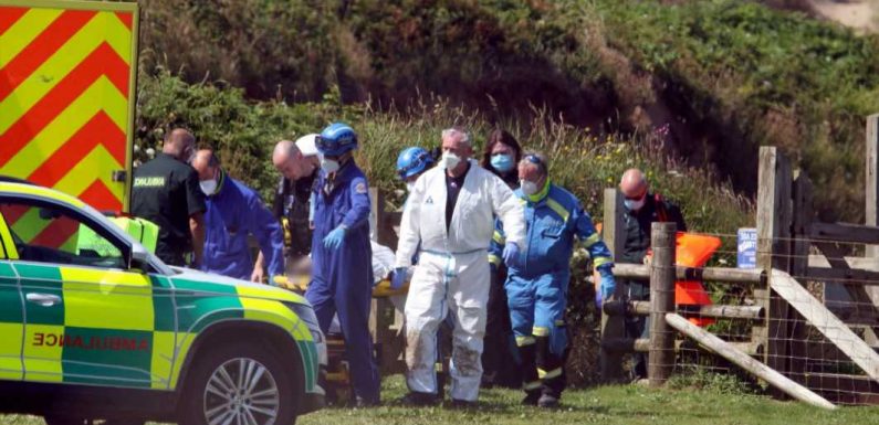 Woman dies at Devon beauty spot after being pulled from sea on hottest day of the year